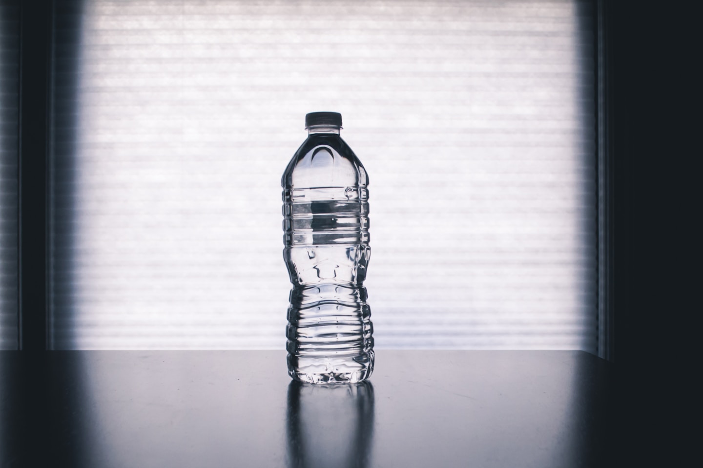 clear drinking bottle filled with water